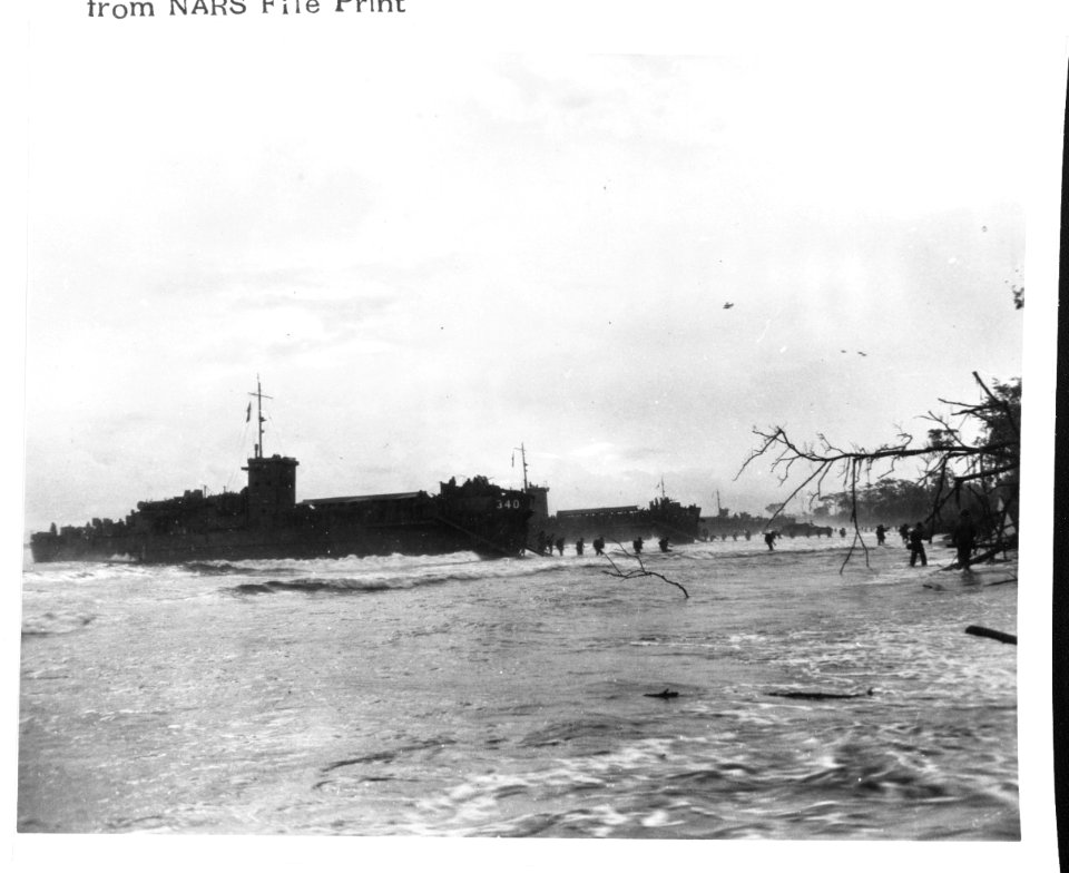 USS LCI-340 and other LCI's landing troops on New Guinea, in the Tor River Toem area