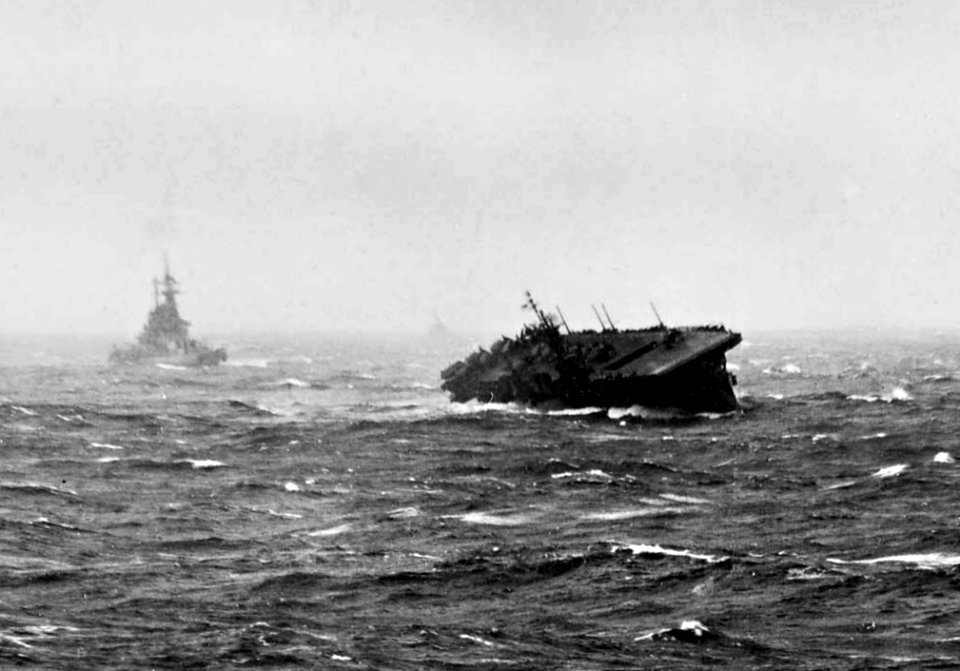 USS Langley (CVL-27) and battleship in typhoon 1944