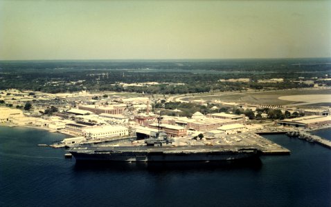 USS Lexington (CVS-16) moored at Naval Air Station Pensacola, Florida (USA), circa in the 1970s (NNAM.1987.171.003)
