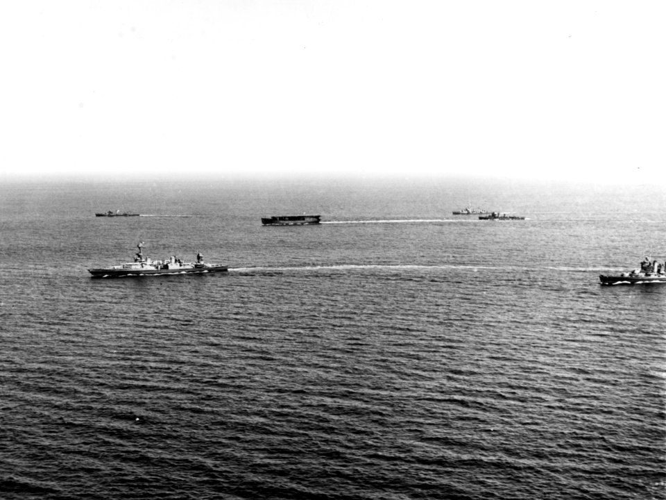 USS Long Island (AVG-1) underway with cruisers and destroyers, in August 1941 (80-G-13074)