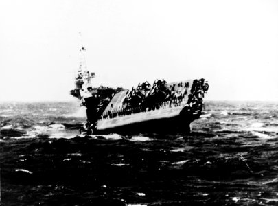 USS Lunga Point (CVE-94) rolling and pitching in heavy seas, in October 1945 (NH 94876)