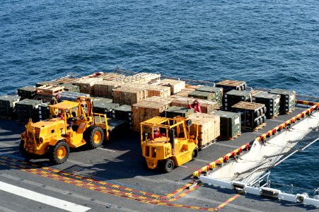 USS Makin Island ammunition on-load 140210-N-GT710-174 photo