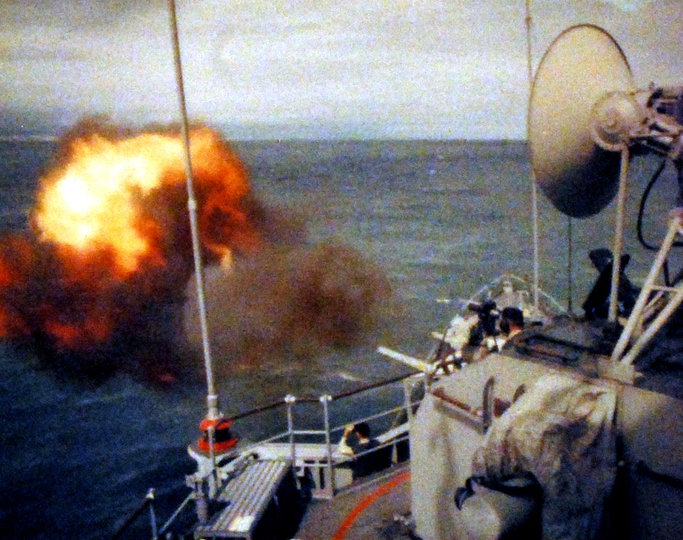 USS Mansfield (DD-728) fires at targets off North Vietnam on 25 November 1966 (428-GX-K-35025)