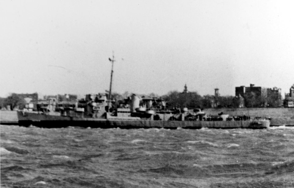 USS Marchand (DE-249) underway in harbour, circa in 1943 (NH 79829)