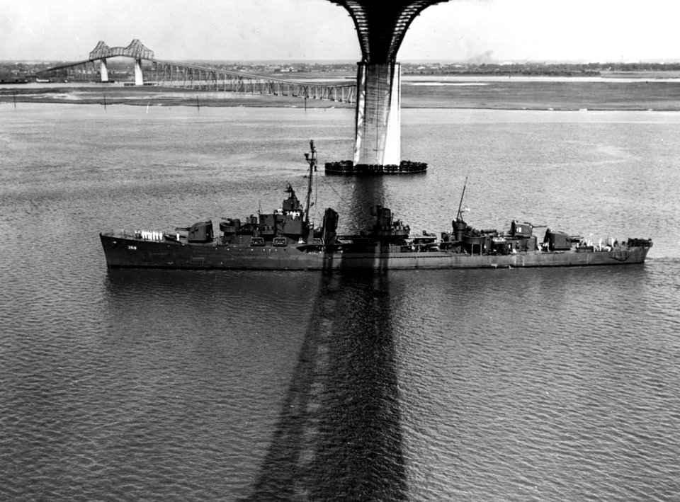 USS McDougal (DD-358) passing under the Cooper River Bridge, Charleston, South Carolina (USA), in June 1945 (19-N-83678)