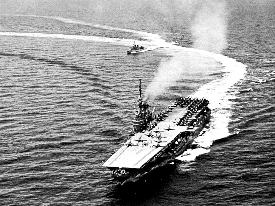 USS Midway (CVA-41) and destroyer in 1955