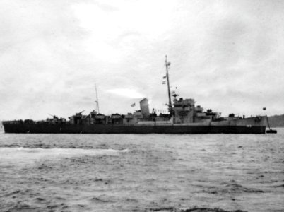 USS Mills (DE-383) moored to a buoy, circa in 1944
