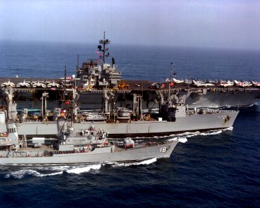 USS Milwaukee (AOR-2) refueling USS Forrestal (CV-59) and USS Semmes (DDG-18) in the Mediterranean Sea on 16 June 1988 (6439969)