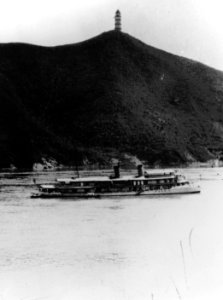 USS Mindanao (PR-8) underway on the West River, China, circa 1934 (NH 80173)