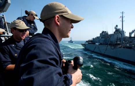 USS Mitscher conducts a replenishment-at-sea. (16249315309)