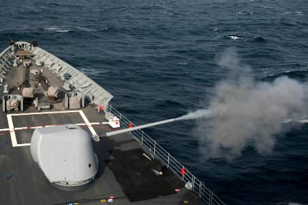 USS Mobile Bay fires its 5-inch gun. (8284404496)