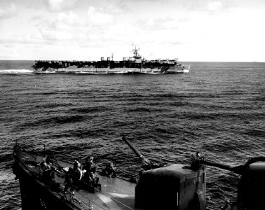 USS Monterey (CVL-26) maneuvers to recover planes, in March 1944 (80-G-247064)