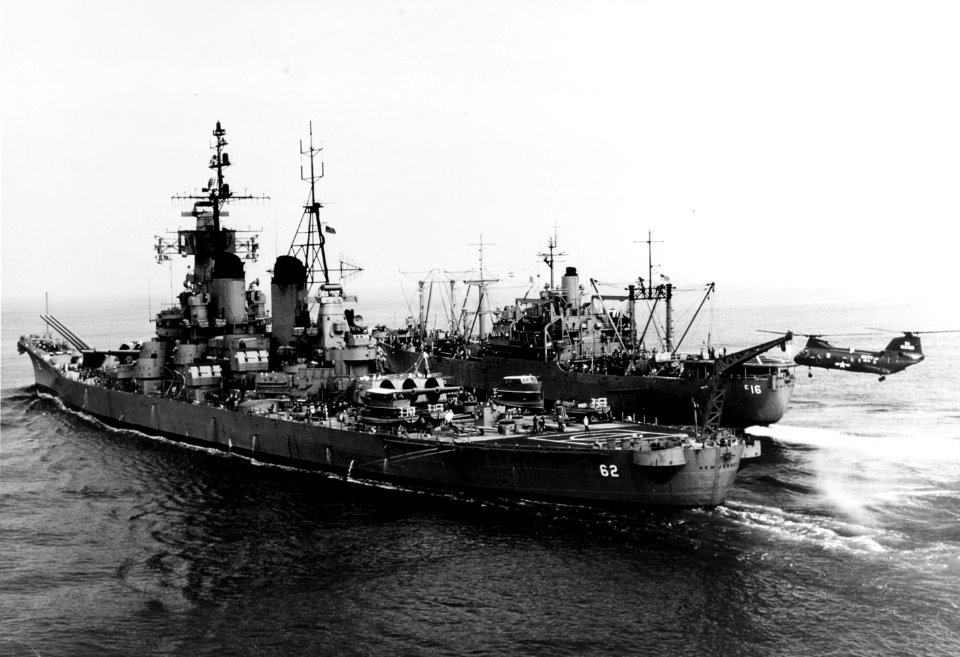 USS Mount Katmai (AE-16) replenishes USS New Jersey (BB-62) off Southern California, 24 July 1968 (K-54519)