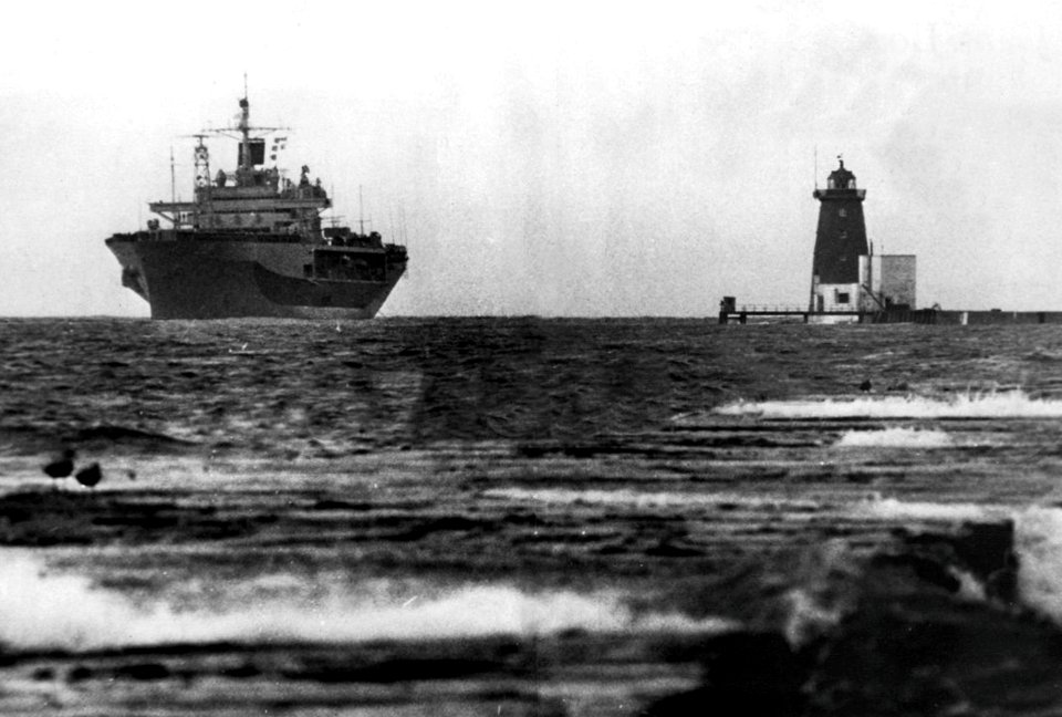 USS Mount Whitney (LCC-20) underway off shore, in 1976