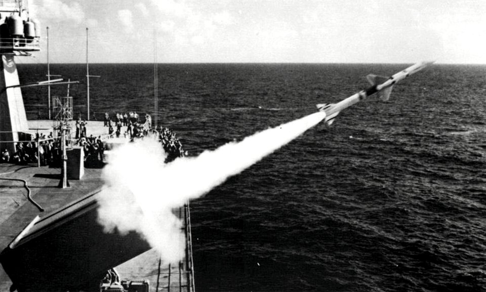 USS Mount Whitney (LCC-20) launches a RIM-7 Sea Sparrow missile, in 1976