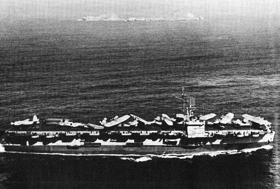 USS Nehenta Bay (CVE-74) underway transporting aircraft, circa 1945