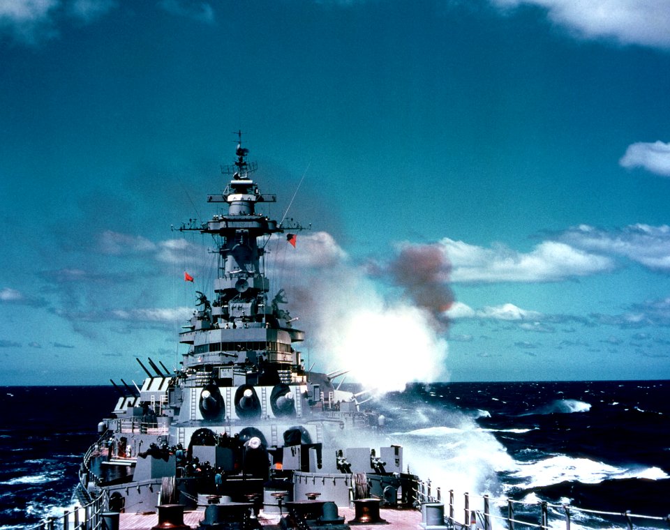 USS New Jersey (BB-62) firing 127 mm guns 1953