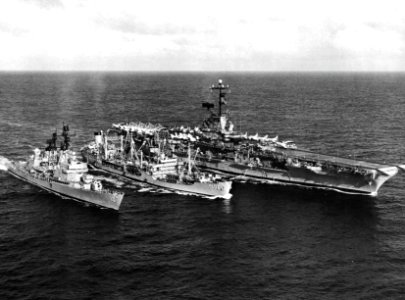 USS Navasota (AO-106) refuels USS Oriskany (CVA-34) and USS King (DLG-10), circa in 1963