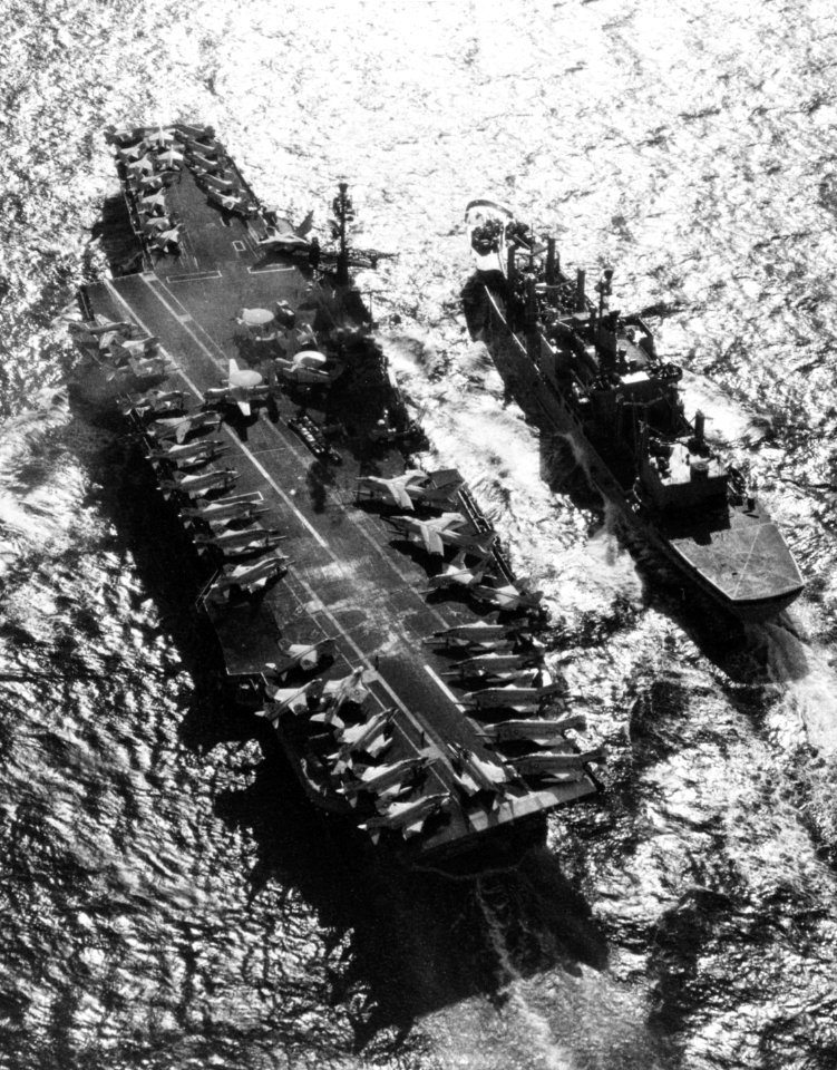 USS Niagara Falls (AFS-3) replenishes USS Coral Sea (CVA-43) in February 1970