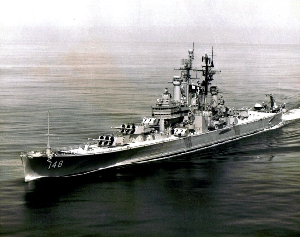 USS Newport News (CA-148) underway in the Atlantic Ocean, in August 1962