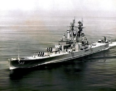 USS Newport News (CA-148) underway in the Atlantic Ocean, in August 1962
