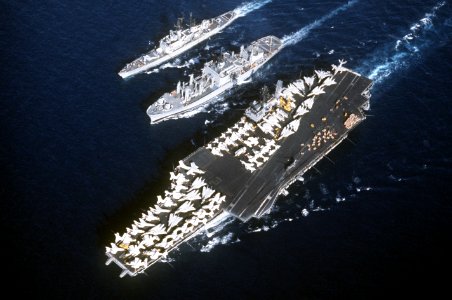 USS Niagara Falls (AFS-3) replenishes USS Constellation (CV-64) and USS Leahy (CG-16) c1978