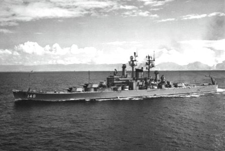 USS Newport News (CA-148) underway at sea, circa in 1967 photo