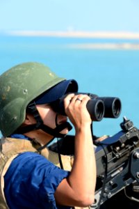USS Nitze sailor stands lookout 140630-N-AT101-111