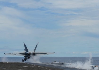 USS Nimitz flight deck activity 140719-N-MX772-311