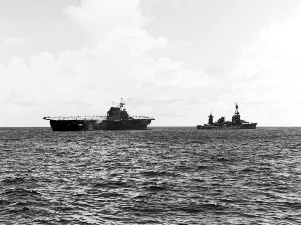 USS Northampton (CA-26) attempting to tow USS Hornet (CV-8) on 26 October 1942 (80-G-33897)