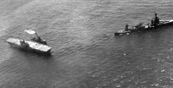 USS Northampton (CA-26) standing by the damaged USS Hornet (CV-8) during the Battle of the Santa Cruz Islands 1942