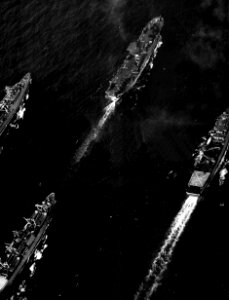 USS Okinawa (LPH-3) underway with other ships c1970