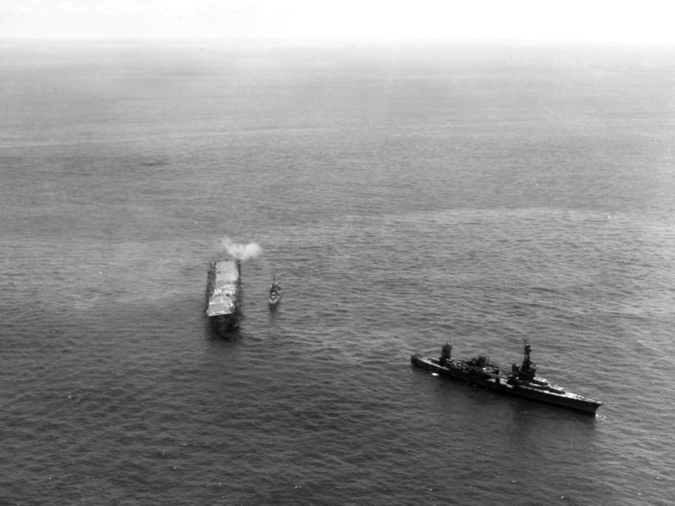 USS Northampton (CA-26) prepares to tow USS Hornet (CV-8) during the Battle of the Santa Cruz Islands on 26 October 1942 (80-G-304517)