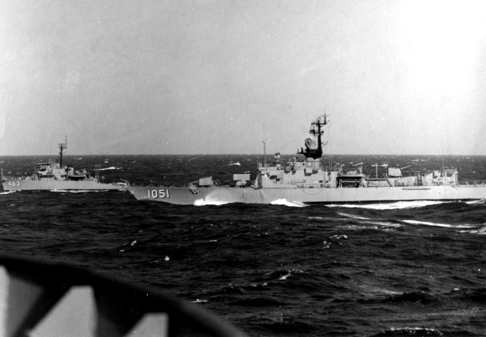 USS O'Callahan (DE-1051) and USS Pivot (MSO-463) underway c1970