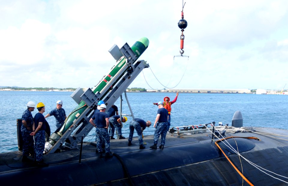 USS Oklahoma City unloads a torpedo. (8578421384)