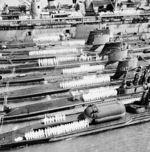 USS Orion (AS-18) with submarines at Norfolk Naval Station in the late 1950s