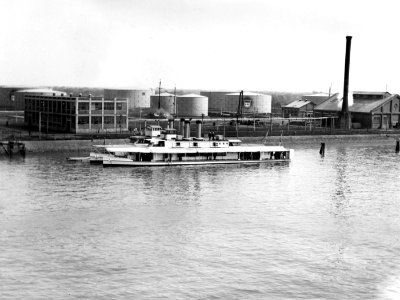 USS Palos (PR-1) and USS Monocacy (PR-2) anchored alongside the Standard Oil Dock, Shanghai, China, circa in 1930 (80-G-1025942)