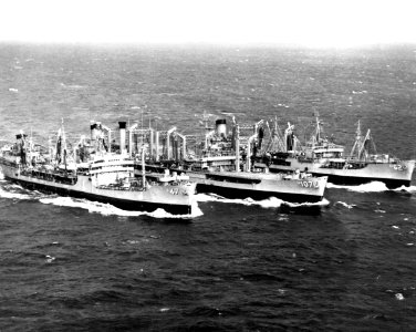 USS Passumpsic (AO-107) refueling USS Neches (AO-47) and USS Taluga (AO-62), circa in 1968 photo