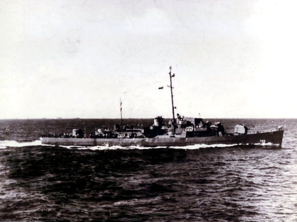 USS Peiffer (DE-588) underway at sea, circa in December 1945