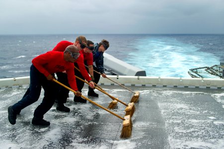 USS Peleliu conducts flight deck wash down 141213-N-EH218-271 photo