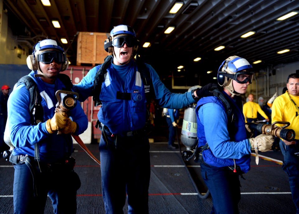 USS Peleliu participate in crash and salvage training 140625-N-ZF681-095
