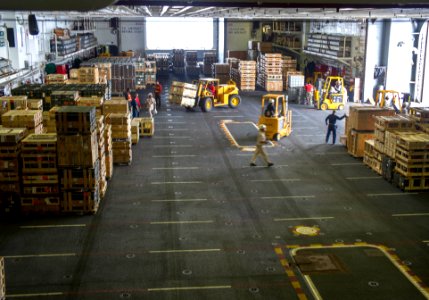USS Peleliu loading ordnance at sea 140826-N-EH218-026