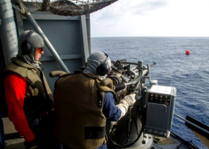 USS Peleliu crew-served weapons gun shoot during PHIBLEX 15 141009-N-HU377-171