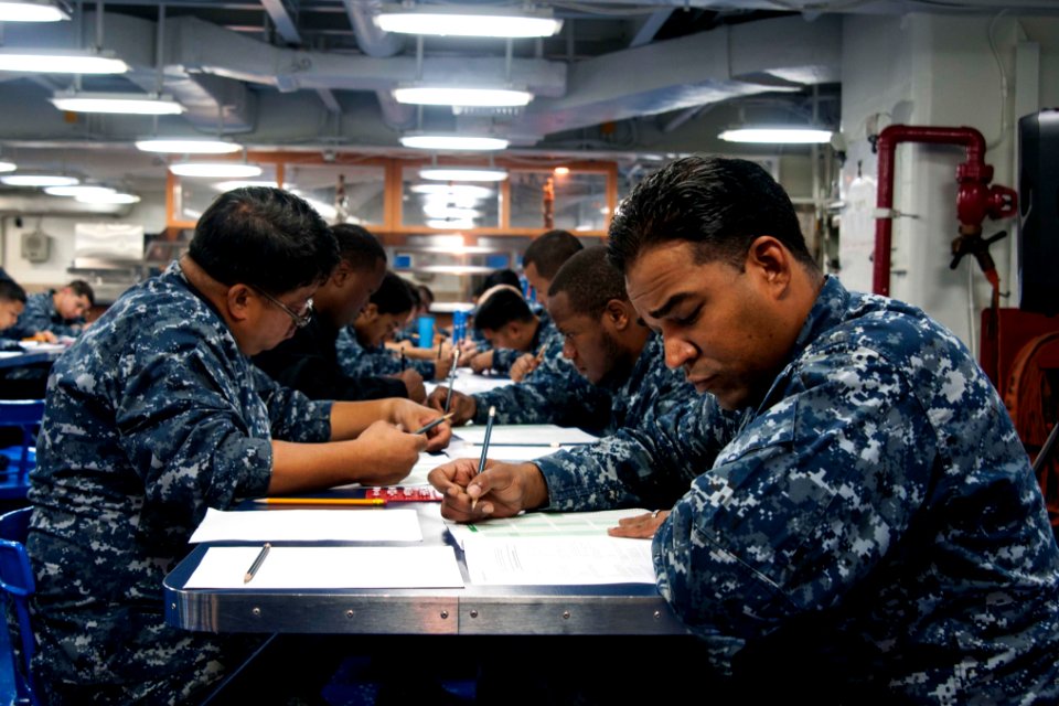 USS Peleliu sailors take E6 Advancement Exam 140306-N-ZM744-021