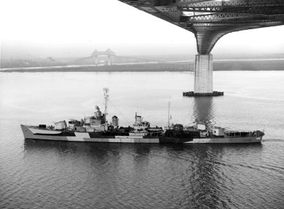 USS Phelps (DD-360) passing under the John P. Grace Memorial Bridge, South Carolina (USA), circa in November 1944 (19-N-73963)