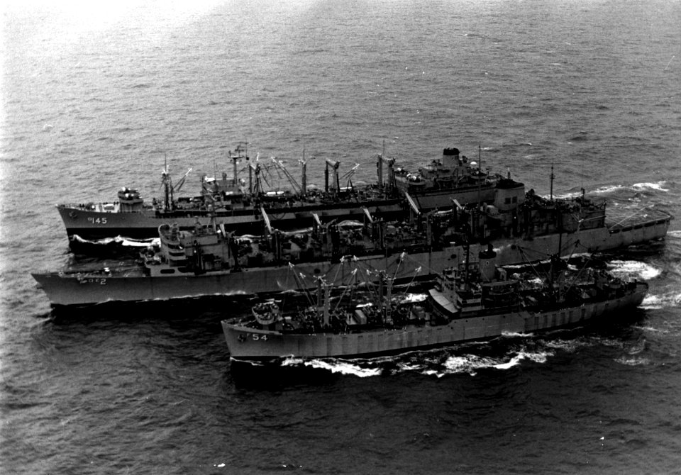 USS Pictor (AF-54) and USS Hassayampa (AO-145) replenish USS Camden (AOE-2), in 1969 (XFC-02171-2-69)