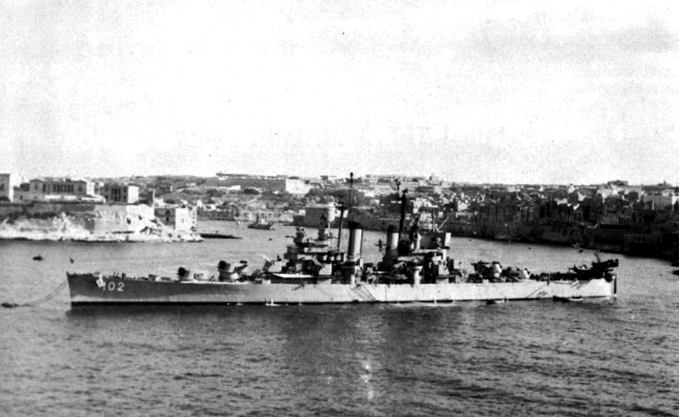 USS Portsmouth (CL-102) at anchor at Valetta, Malta, in early 1948