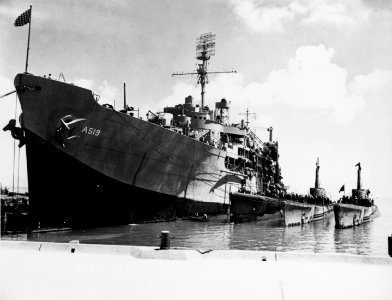 USS Proteus (AS-19) with USS Bang (SS-385), USS Pintado (SS-387) and USS Pilotfish (SS-386) at Midway in May 1944