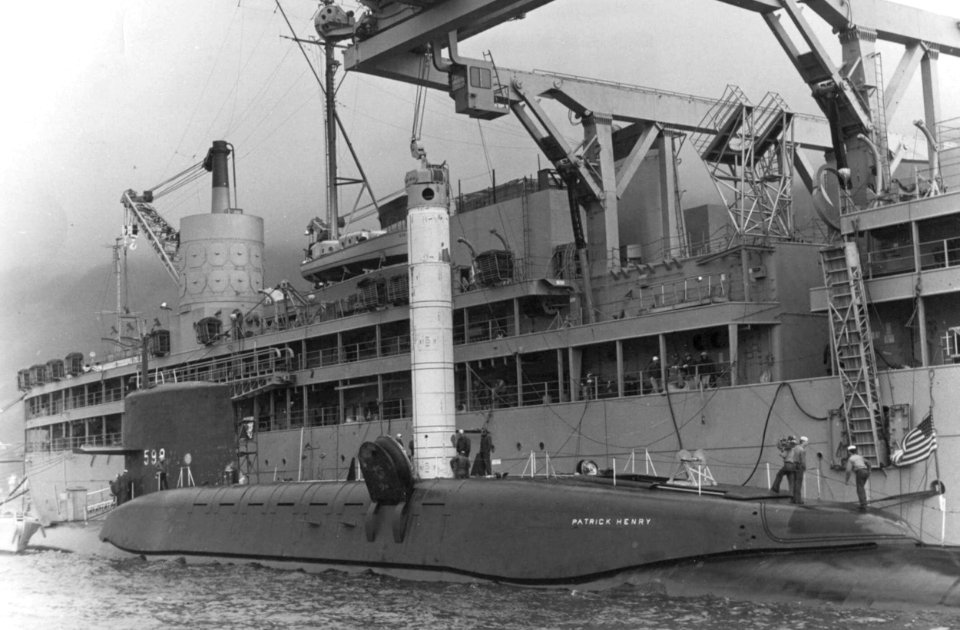 USS Proteus (AS-19) loads Polaris missile onto USS Patrick Henry (SSBM-599) in March 1961