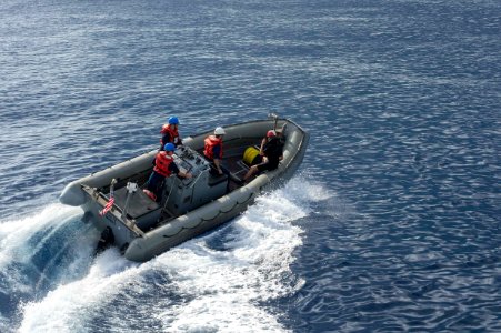 USS Ramage man overboard drill 131206-N-VC236-031 photo